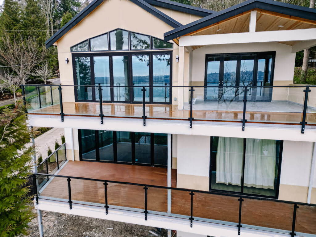 multi level deck with framed glass railing